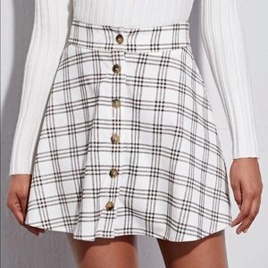 Plaid button front cord skirt